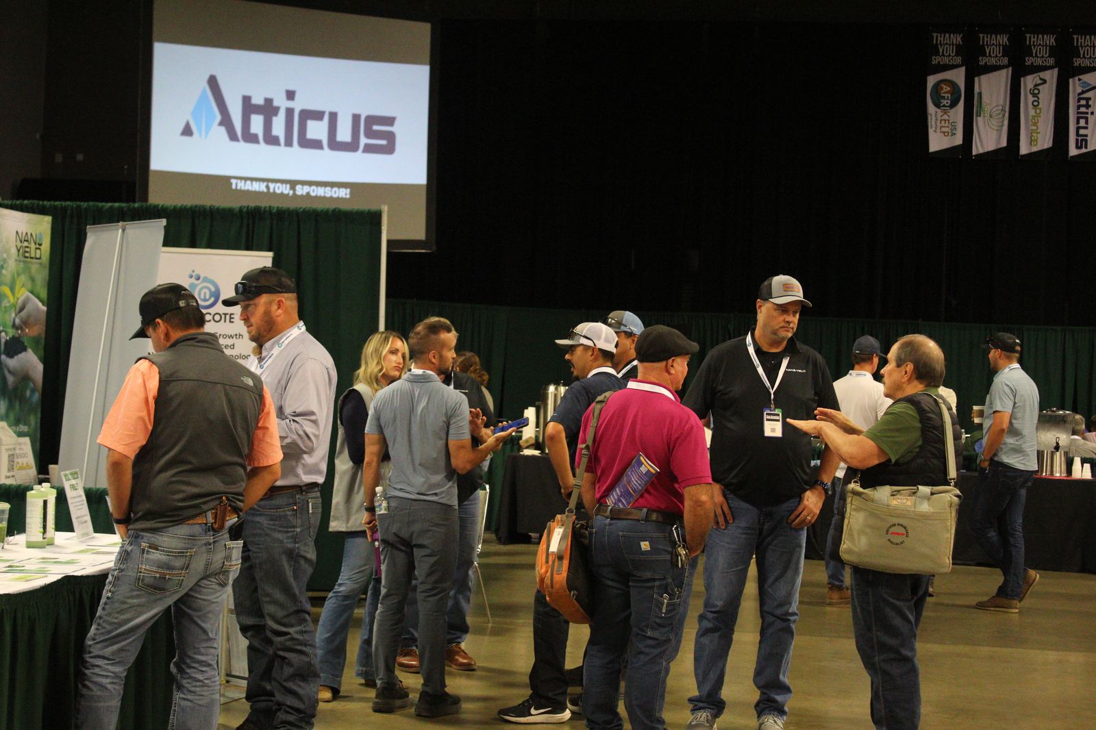Attendees networking on the Crop Consultant Conference trade-show floor