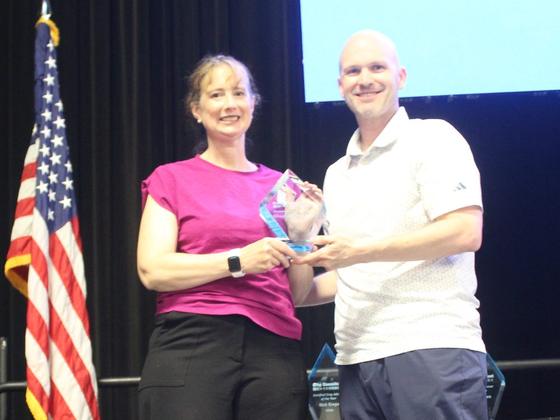 Dr. Elizabeth Fichtner with her Researcher of the Year award